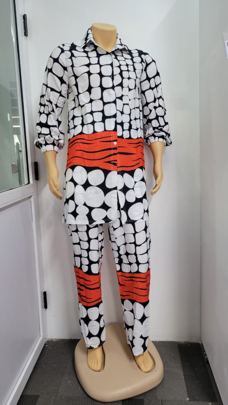 A two-piece trouser and shirt suit