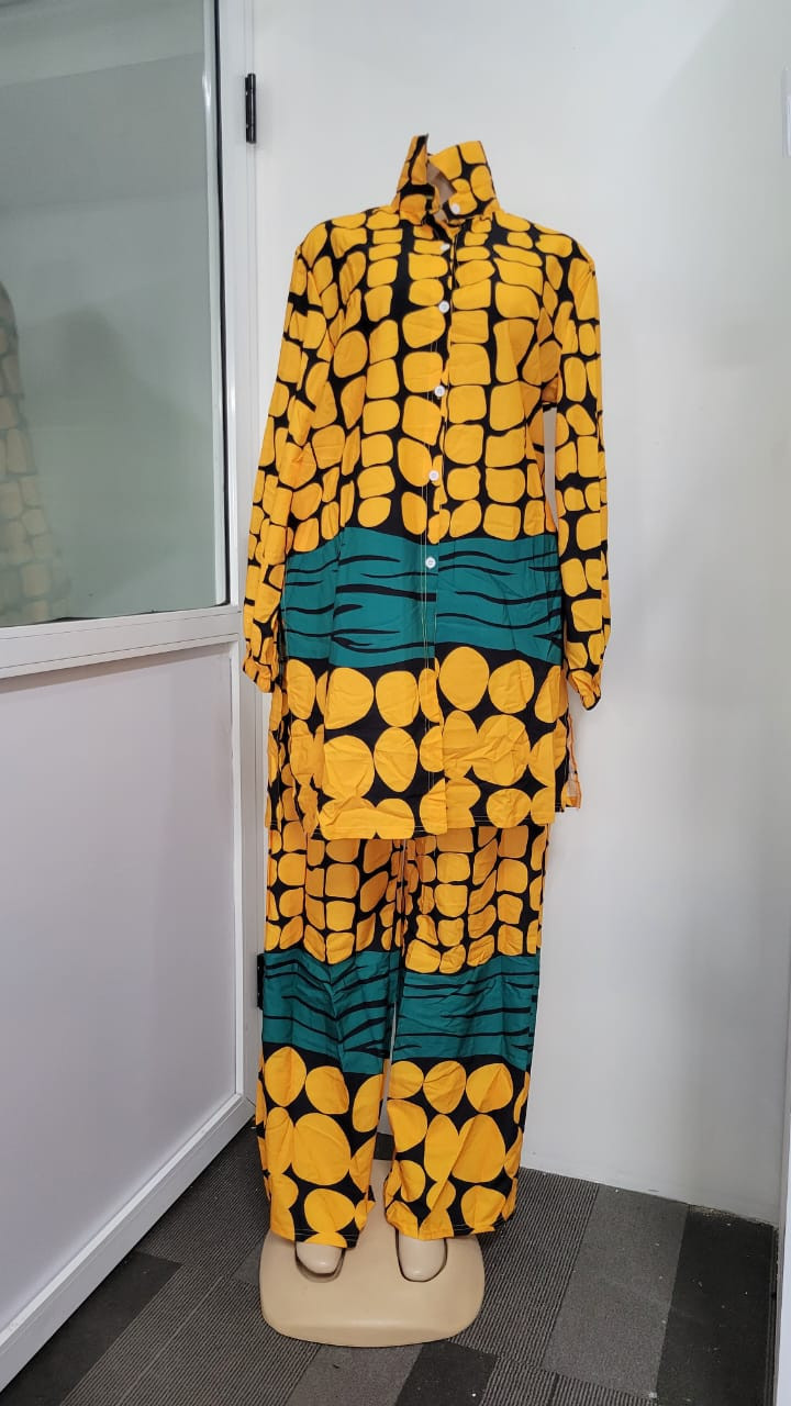 A two-piece trouser and shirt suit